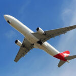 Qantas Australian Airlines plane departing from Sydney Airport, view from below