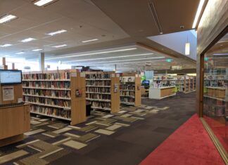 It’s Official Lane Cove Locals Love their Library and If You Join Up in July You Can Win Prizes Interior of Lane Cove Library showing book stacks and reading area
