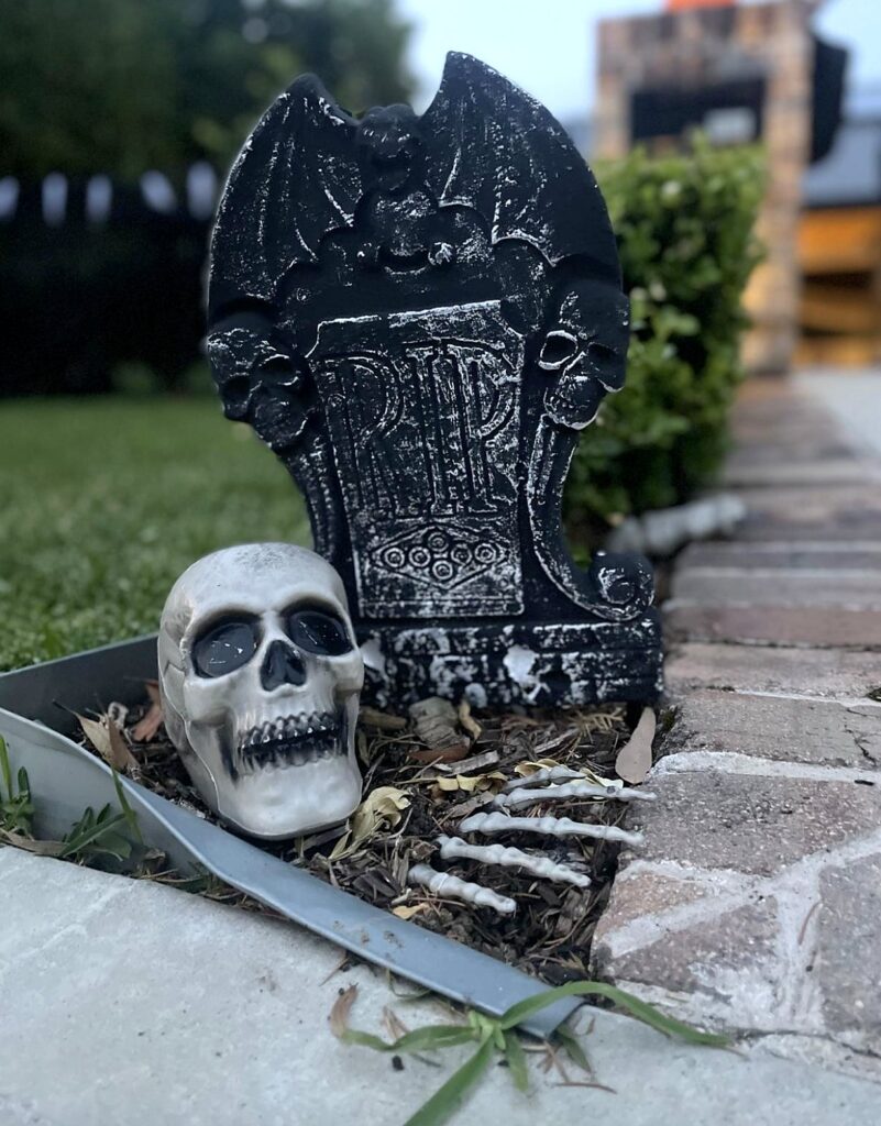 Halloween tombstone and skull decorations in Lane Cove