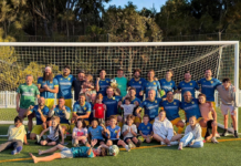 A soccer team posing