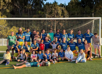 A soccer team posing