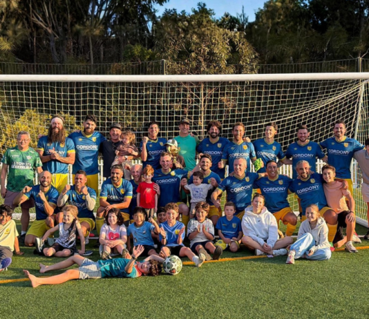 A soccer team posing
