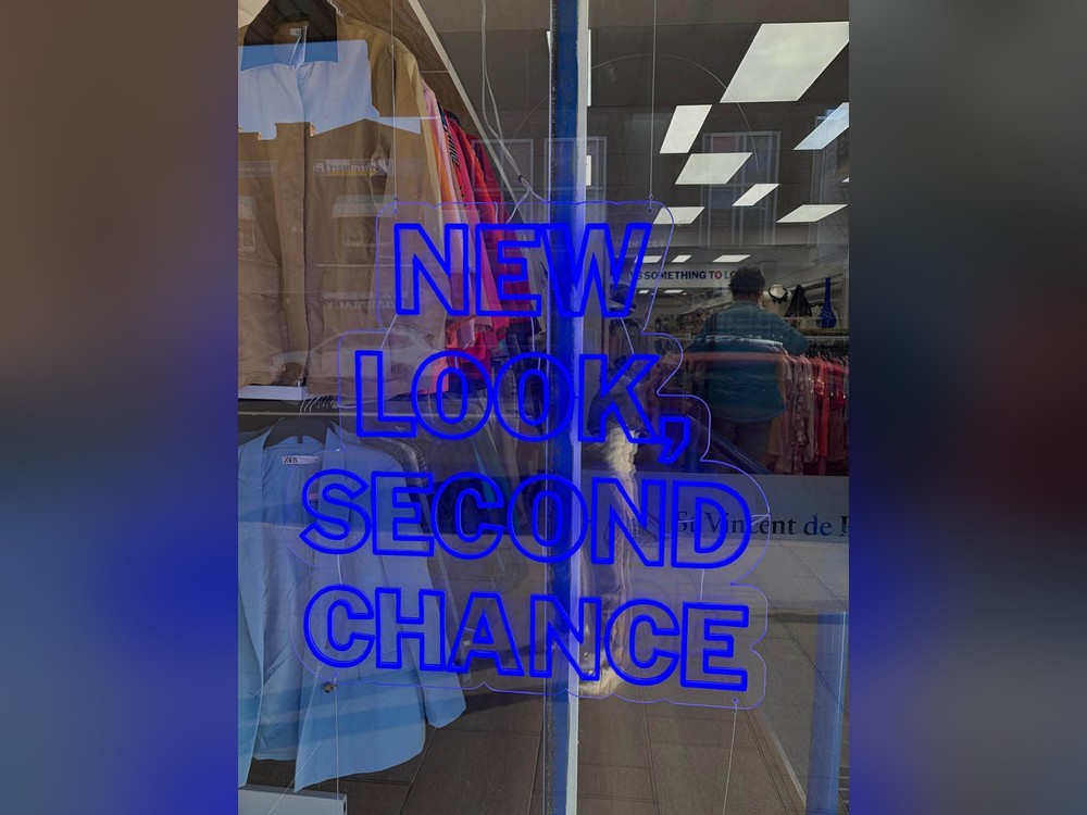 Vinnies Lane Cove shop window with New look, second chance signage