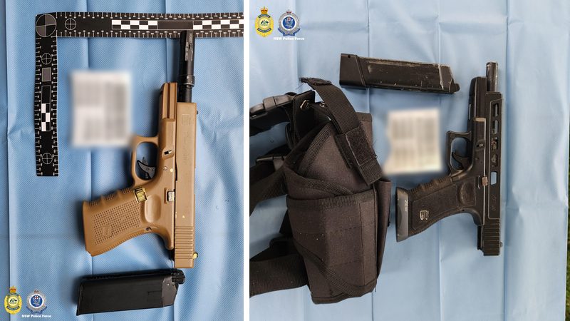 Tan pistol beside a forensic scale and a black pistol with a magazine and holster on blue evidence sheets