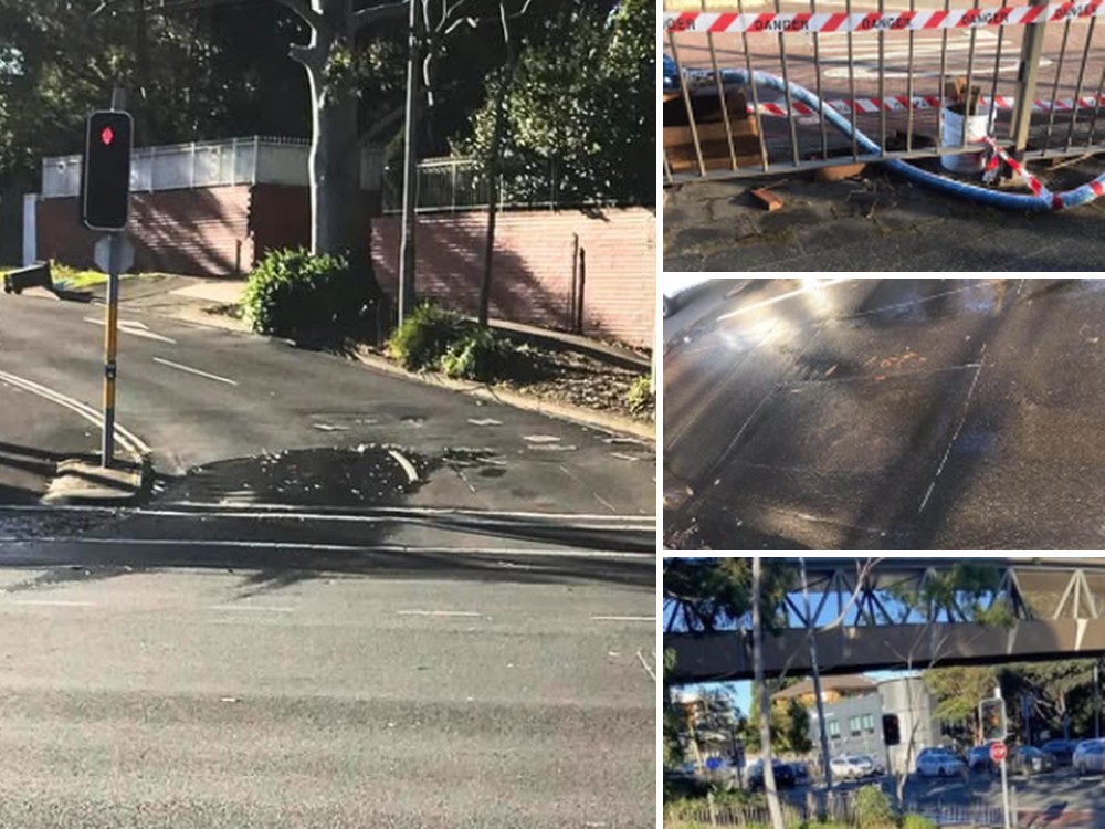 Water leaking across Epping Road at Parklands Avenue, with Sydney Water barriers and pipework at the site